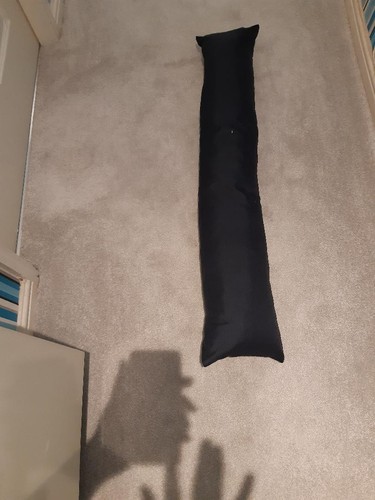 Draught excluder for door